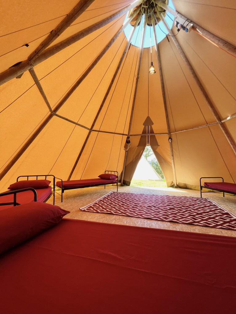 Inside of the Giant Tipi when setup for families