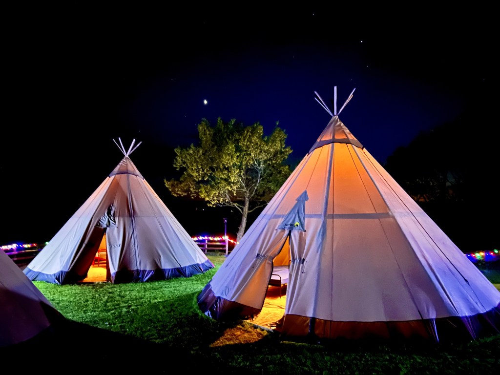 Giant Tipis at night