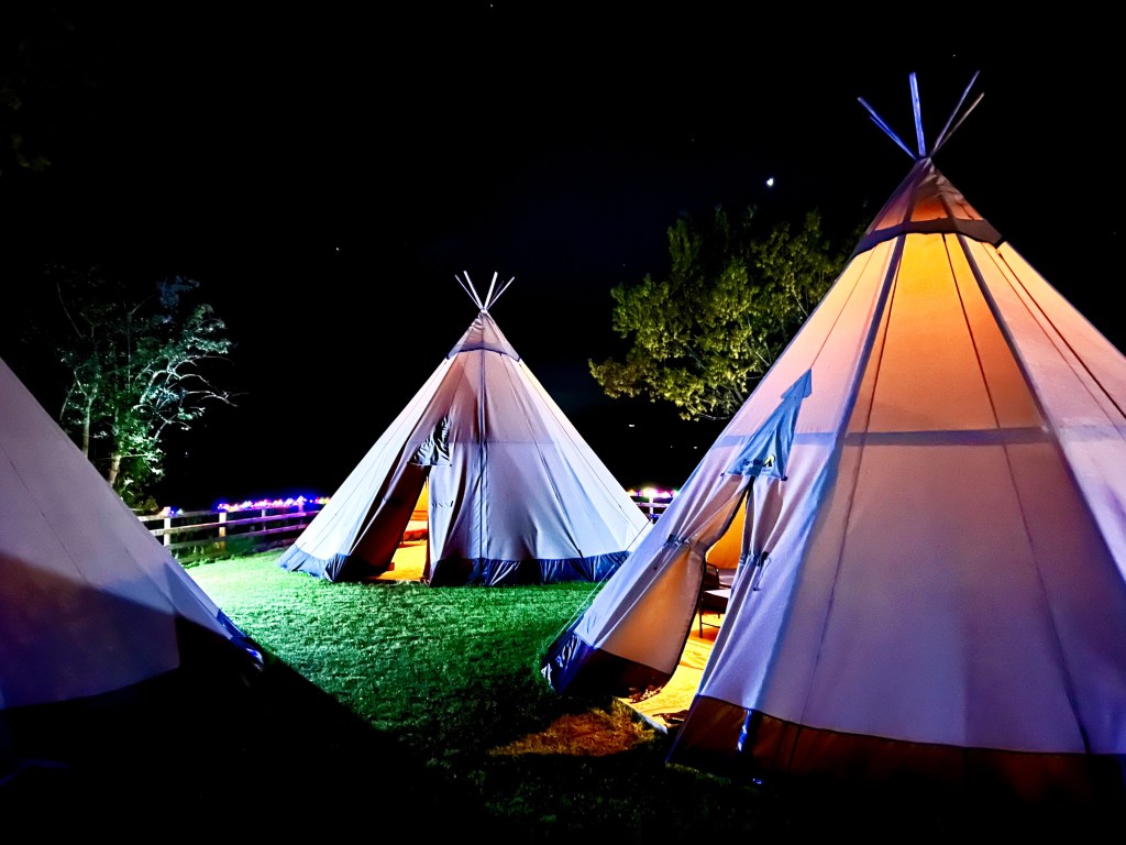 Giant Tipis at night